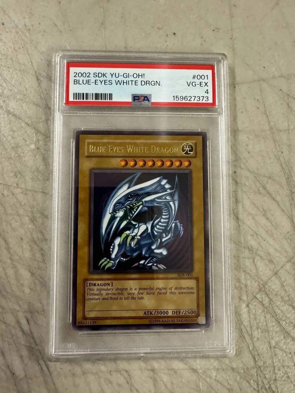 Yu-Gi-Oh 2002 Starter Deck Kaiba SDK-001 Blue-Eyes White Dragon Card PSA 4 VG-EX
